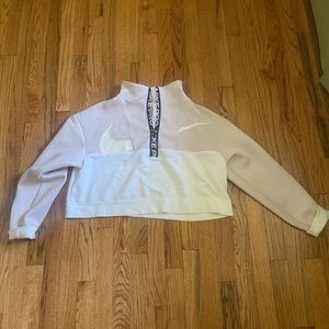 Women’s medium Nike Pro half zip. Small mark on bottom of sweatshirt shown